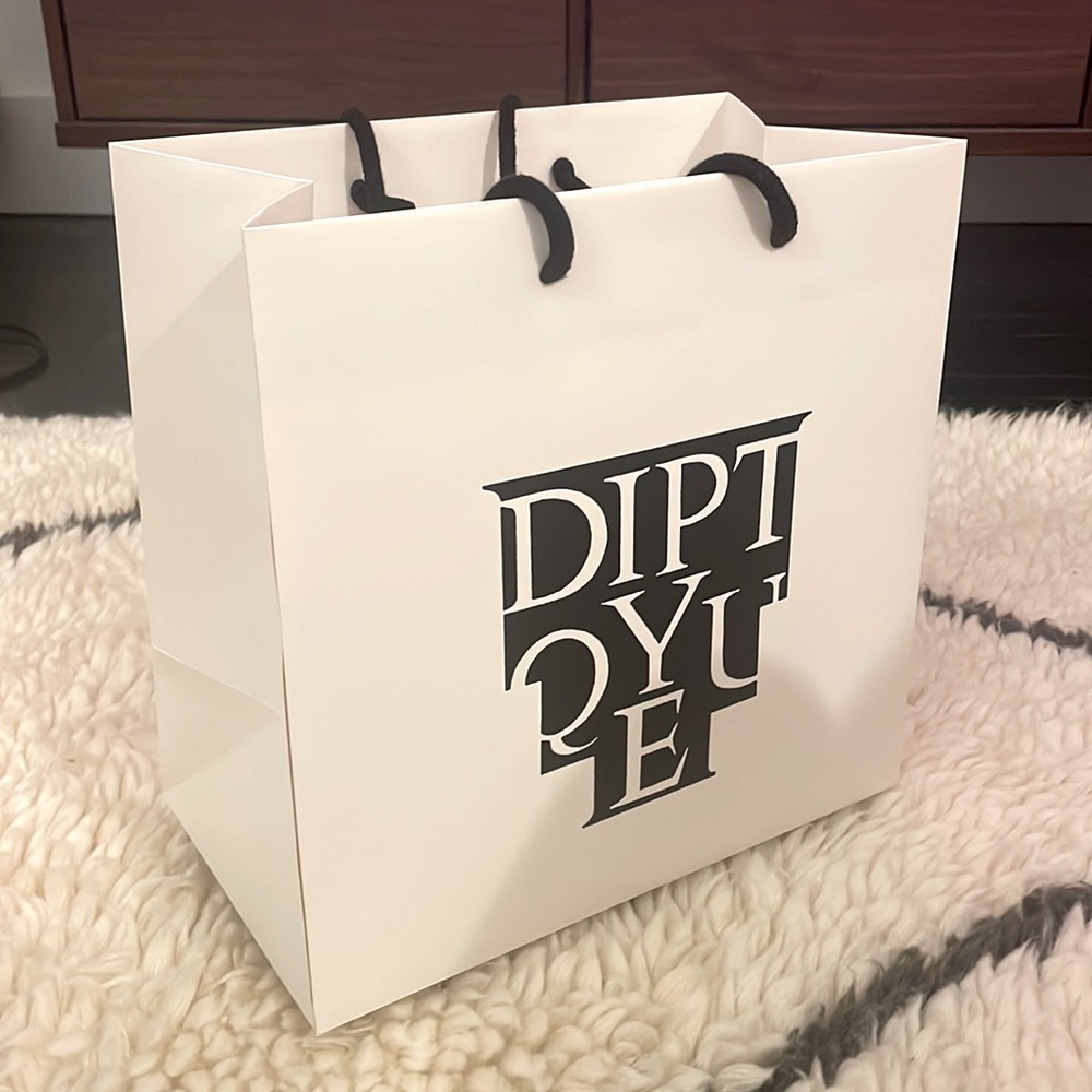 Large empty Diptqyue paper shopping bag